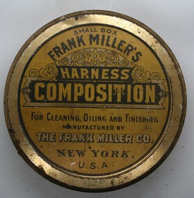 squat circular tin can, yellow lid with contents printed on face.