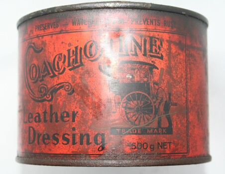 Squat red tin can with press lid with instructions  printed on side