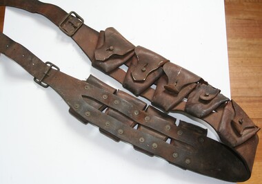 Brown leather belt with pouches for carrying ammunition