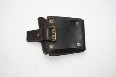 Brown leather ammunition pouch stud fastened.