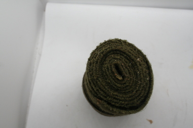 Army green cloth  used to wrap around lower leg ,puttee, offering some protection