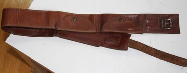 leather waist belt with small pockets all round