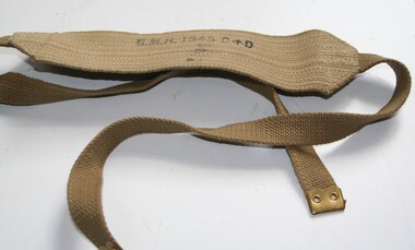 Military shoulder strap with brass ends to enable attachment of ammunition pouches