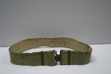 Military webbing belt with brass fittings.