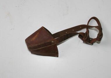 Small brown leather muzzle to fit over dogs nose