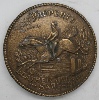 Brass belt buckle advertising Properts leather and saddle soap