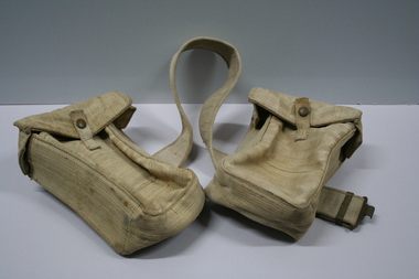 Two canvas webbing bags used by military to carry ammunition and small objects
