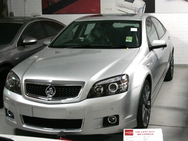 Silver grey four door WN caprice sedan