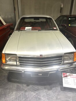 Silver/Grey painted VB Commodore. Chrome bumpers and light surrounds. 