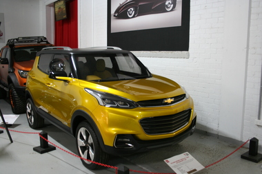 Gold body with black painted roof, small SUV type vehicle