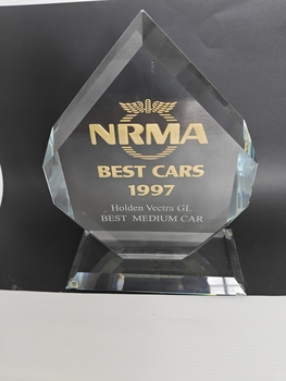 glass inscribed trophy on glass stand