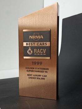 brass veneered black acrylic trophy