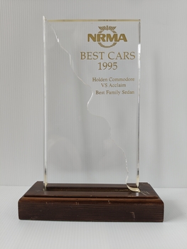 acrylic trophy on timber stand
