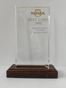 acrylic trophy on timber stand