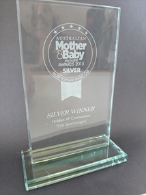 glass award on glass mounting plate