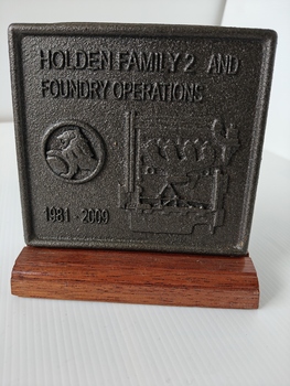 cast alloy award on timber stand