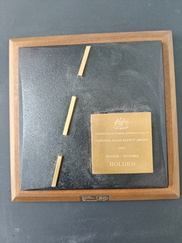 wall mounted cast plaque with timber frame