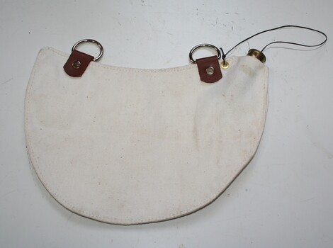 Saddle shaped canteen used to carry water