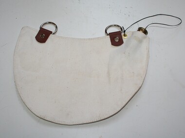 Saddle shaped canteen used to carry water