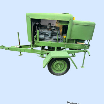 Green portable welder powered by Holden motor