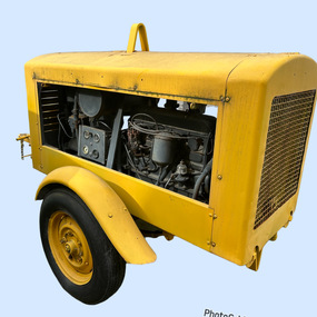 Yellow mobile generator powered by Holden motor