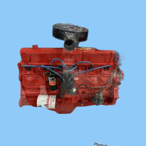 Holden 186 red motor with black air filter and fan