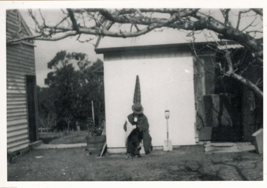 Photograph (sub-item) - The Heims’ family home, about 1933, with Mr. Van der Sluys in foreground