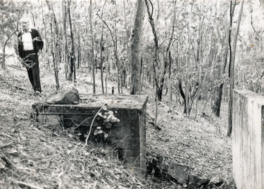 Photograph (sub-item) - Black and White, The remains of the Ammunition Store on Stane Brae, 1984.  During World War II soldiers were trained here.  Mr. Fred Renton on left