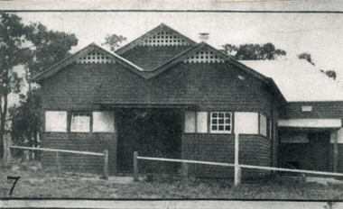 The white roof to the left of the photo is that of the old hall which formed part of the stage and supper room of this hall