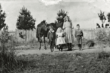 Photograph (Item) - Black and White, 4 students outside WP School c. 1915, About 1920