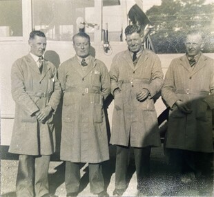 Photograph - Black and White Photo of, Four bus drivers