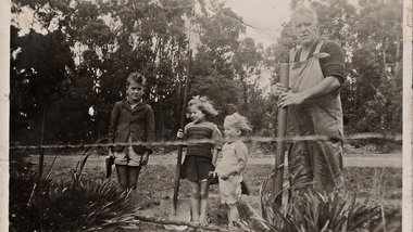 Photograph - Edgar Ernest Walter, of Wonga Park and three grandchildren most likely Garry, Janice and Sandra Faram with Jumping Creek (then Warrandyte) Road in background