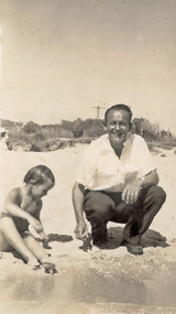 Photograph - Francis George Faram, (of Wonga Park) and child at the beach