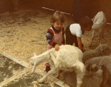 Photograph, POCH & LC Playgroup visiting the animal farm 1984, with Daniel Schubert patting a goat