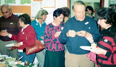 Photograph, Group of people enjoying food and drink at the Park Orchards Community House