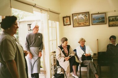 Photograph, Group of people at the Community House  (POCH)