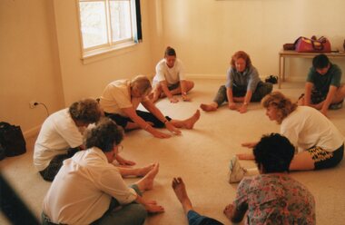 Photograph, Women stretching in a class at the Community House  (POCH)