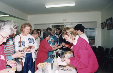 Photograph, Group of ladies enjoying food at the Park Orchards Community House