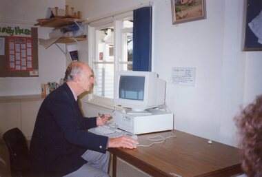 Photograph, Man at circa 1990 computer at Park Orchards Community House