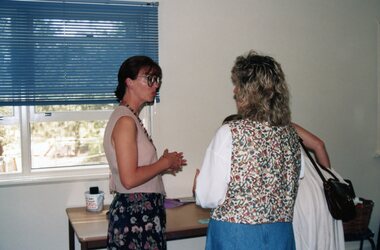 Photograph, One lady talking to another at Park Orchards Community Centre