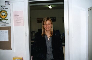 Photograph, Lady walking into Park Orchards Community Centre office, Unknown year