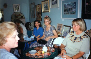 Photograph, Group of people among artwork at Park Orchards Community Centre, Unknown date