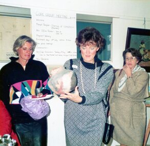Photograph, Presenting a pottery gift to Betty at Park Orchards Community Centre, 1987
