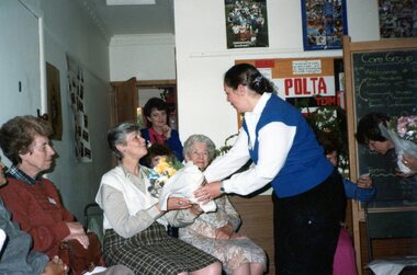 Photograph, Presentation of flowers to a lady at Park Orchards Community Centre