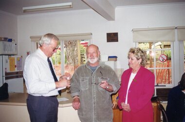 Photograph, Artist talking to officials at Park Orchards Community House, Unknown date