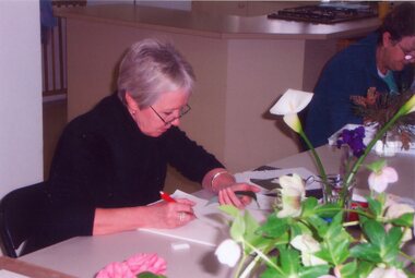 Photograph, Artist drawing a leaf at Park Orchards Community House, Unknown date