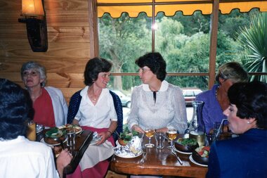 Photograph, POCH ladies enjoying meal at restaurant, Unknown date