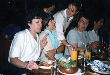 Photograph, POCH ladies enjoying meal at restaurant, Unknown date