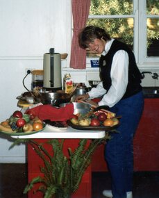 Photograph, Betty Cole in kitchen at Park Orchards Community Centre, Unknown date