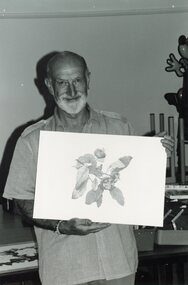 Photograph, Artist showing his painting at Park Orchards Community Centre, Unknown date
